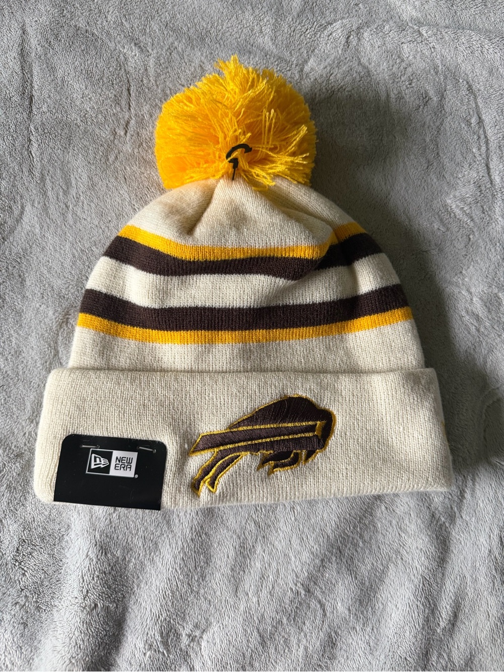 NFL Kids Cream, Yellow & Brown Pom Beanie with Team Patch